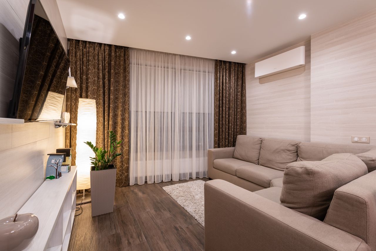 Clean, fully restored living room after professional water damage restoration